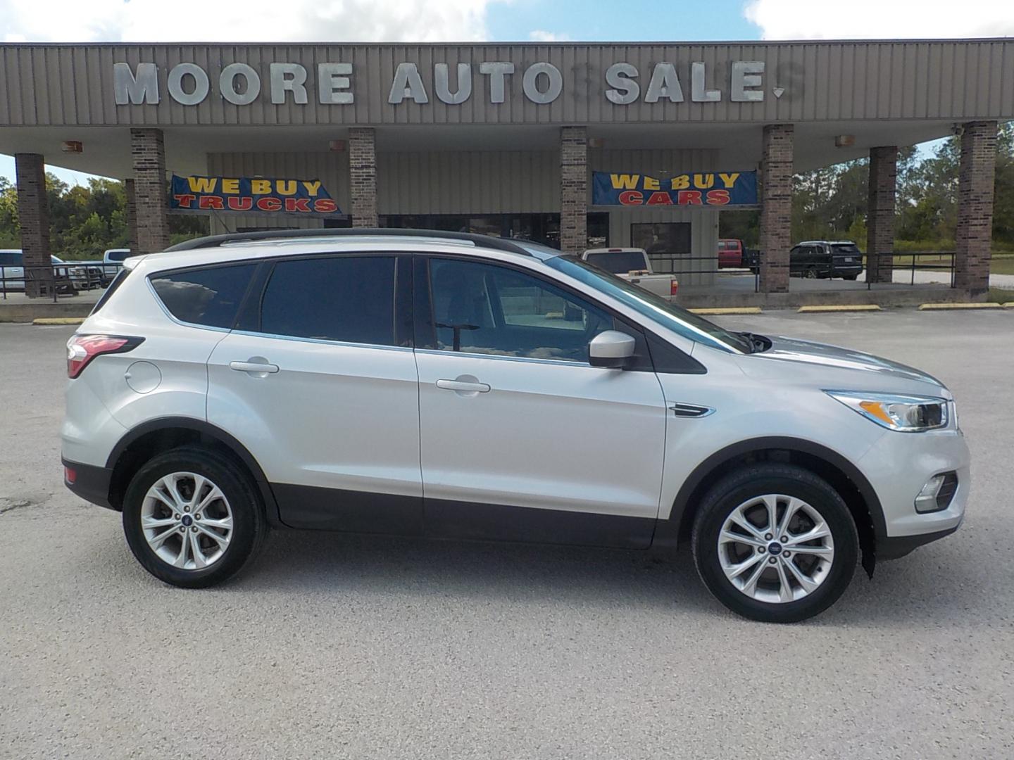 2018 Silver /Black Ford Escape SE 4WD (1FMCU9GD3JU) with an 1.5L L4 DOHC 16V engine, 6A transmission, located at 1617 W Church Street, Livingston, TX, 77351, (936) 327-3600, 30.710995, -94.951157 - 4X4!! Can use the 4X4 this time of year no doubt! Come check this one out for yourself!! - Photo#0