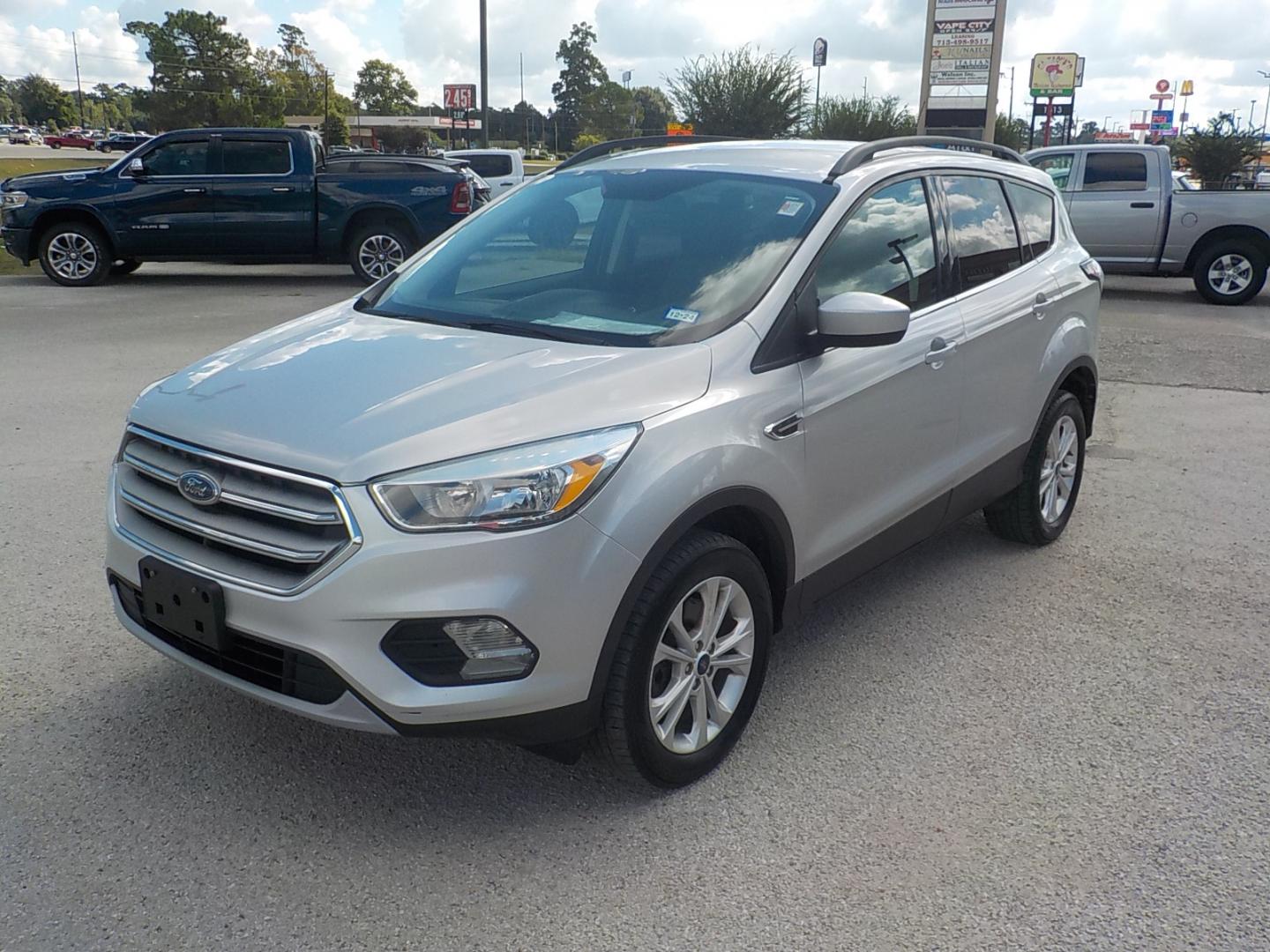 2018 Silver /Black Ford Escape SE 4WD (1FMCU9GD3JU) with an 1.5L L4 DOHC 16V engine, 6A transmission, located at 1617 W Church Street, Livingston, TX, 77351, (936) 327-3600, 30.710995, -94.951157 - 4X4!! Can use the 4X4 this time of year no doubt! Come check this one out for yourself!! - Photo#3