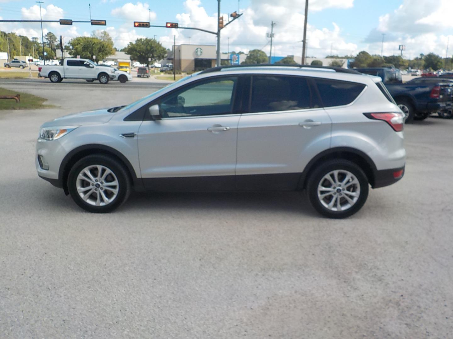 2018 Silver /Black Ford Escape SE 4WD (1FMCU9GD3JU) with an 1.5L L4 DOHC 16V engine, 6A transmission, located at 1617 W Church Street, Livingston, TX, 77351, (936) 327-3600, 30.710995, -94.951157 - 4X4!! Can use the 4X4 this time of year no doubt! Come check this one out for yourself!! - Photo#4
