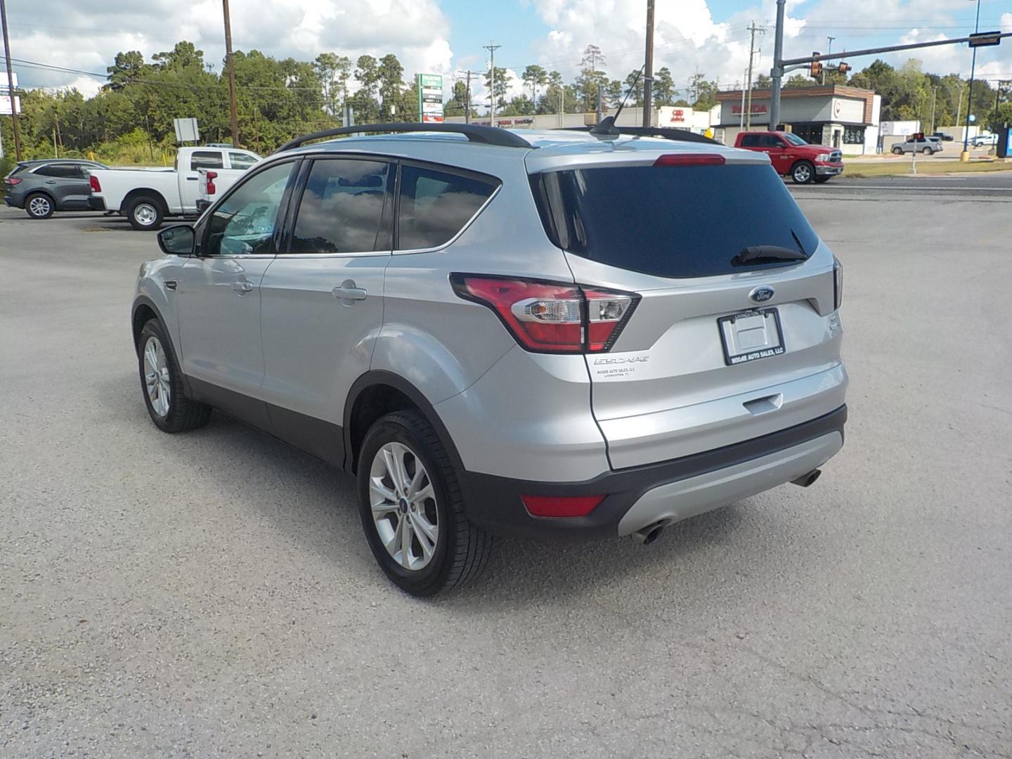 2018 Silver /Black Ford Escape SE 4WD (1FMCU9GD3JU) with an 1.5L L4 DOHC 16V engine, 6A transmission, located at 1617 W Church Street, Livingston, TX, 77351, (936) 327-3600, 30.710995, -94.951157 - 4X4!! Can use the 4X4 this time of year no doubt! Come check this one out for yourself!! - Photo#5