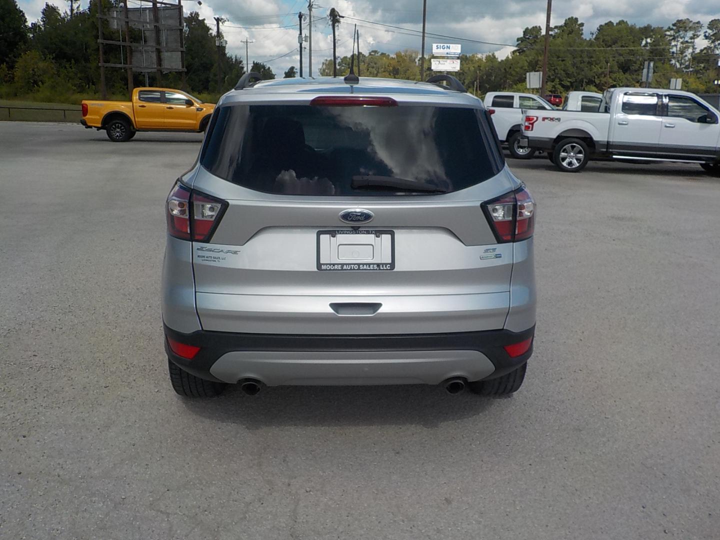 2018 Silver /Black Ford Escape SE 4WD (1FMCU9GD3JU) with an 1.5L L4 DOHC 16V engine, 6A transmission, located at 1617 W Church Street, Livingston, TX, 77351, (936) 327-3600, 30.710995, -94.951157 - 4X4!! Can use the 4X4 this time of year no doubt! Come check this one out for yourself!! - Photo#6