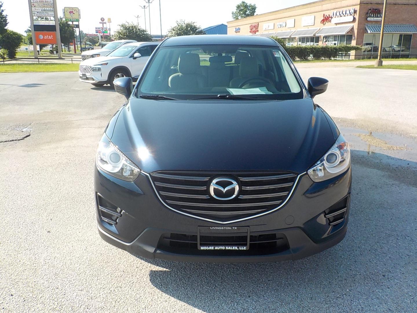 2016 Blue Mazda CX-5 (JM3KE2BY0G0) , Automatic transmission, located at 1617 W Church Street, Livingston, TX, 77351, (936) 327-3600, 30.710995, -94.951157 - LOW MILES FOR THE YEAR!! SPORTY!! - Photo#2
