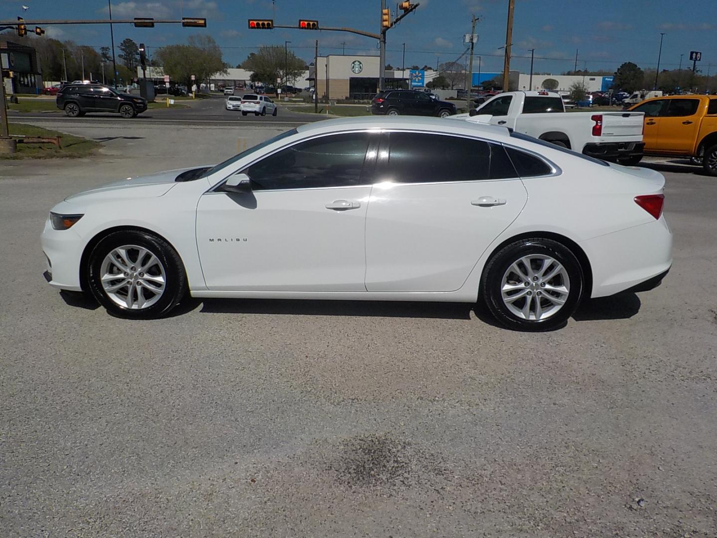 2018 White /Black Chevrolet Malibu LT (1G1ZD5STXJF) with an 1.5L L4 DOHC 16V engine, 6A transmission, located at 1617 W Church Street, Livingston, TX, 77351, (936) 327-3600, 30.710995, -94.951157 - I love these vehicles!! Family size and economical to boot!! - Photo#4