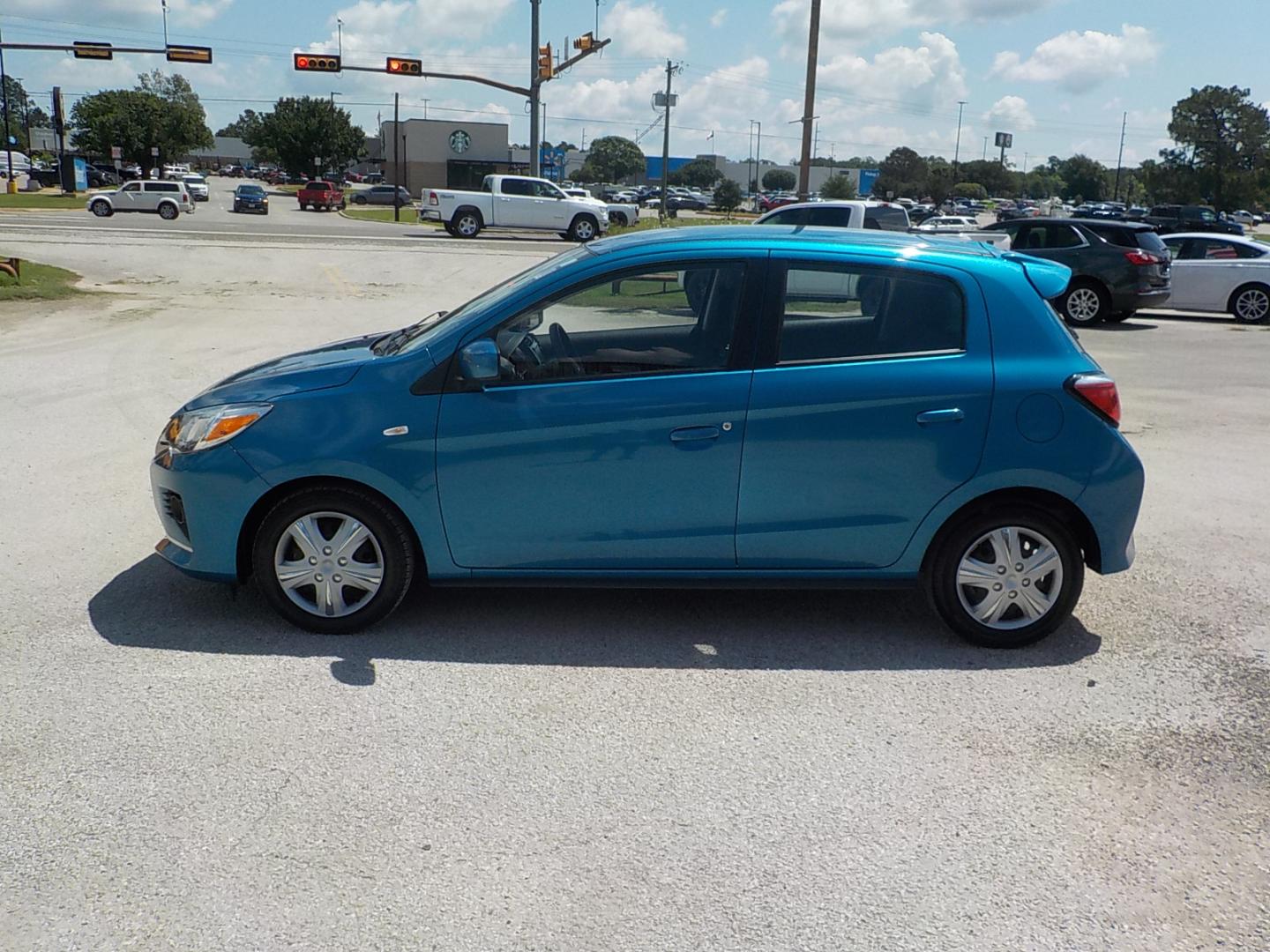 2021 Blue Mitsubishi Mirage ES CVT (ML32AUHJ9MH) with an 1.2L L3 DOHC engine, CVT transmission, located at 1617 W Church Street, Livingston, TX, 77351, (936) 327-3600, 30.710995, -94.951157 - Great economical car right here! - Photo#5