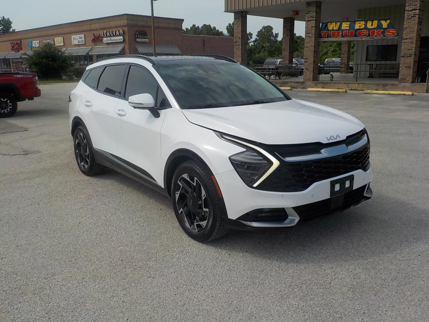 2023 White /Black Kia Sportage SX-Prestige (5XYK53AF2PG) with an 2.5L V6 DOHC 24V engine, 8A transmission, located at 1617 W Church Street, Livingston, TX, 77351, (936) 327-3600, 30.710995, -94.951157 - SPORTY!! NICE!! 1ST two words that come to mind when I see this one! - Photo#1