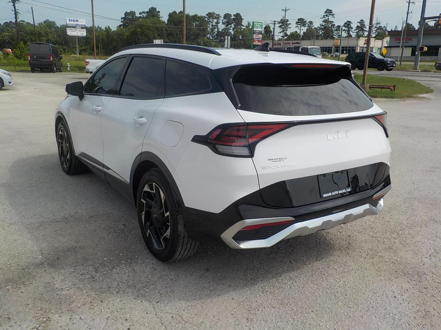 2023 White /Black Kia Sportage SX-Prestige (5XYK53AF2PG) with an 2.5L V6 DOHC 24V engine, 8A transmission, located at 1617 W Church Street, Livingston, TX, 77351, (936) 327-3600, 30.710995, -94.951157 - SPORTY!! NICE!! 1ST two words that come to mind when I see this one! - Photo#5