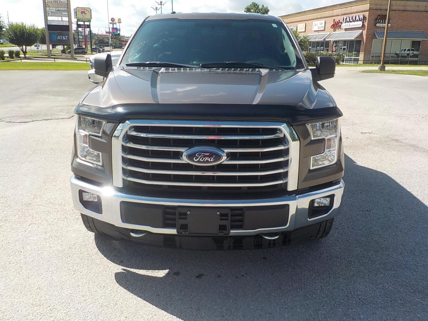 2015 Brown /Tan Ford F-150 XLT SuperCrew 6.5-ft. Bed 4WD (1FTEW1EF0FK) with an 5.0L V8 engine, 6-Speed Automatic transmission, located at 1617 W Church Street, Livingston, TX, 77351, (936) 327-3600, 30.710995, -94.951157 - ONE OWNER!! Been here in Livingston all it's life. This truck was well maintained! Buy it with confidence! - Photo#2