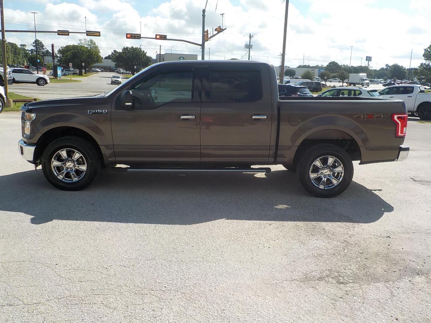 2015 Brown /Tan Ford F-150 XLT SuperCrew 6.5-ft. Bed 4WD (1FTEW1EF0FK) with an 5.0L V8 engine, 6-Speed Automatic transmission, located at 1617 W Church Street, Livingston, TX, 77351, (936) 327-3600, 30.710995, -94.951157 - ONE OWNER!! Been here in Livingston all it's life. This truck was well maintained! Buy it with confidence! - Photo#4