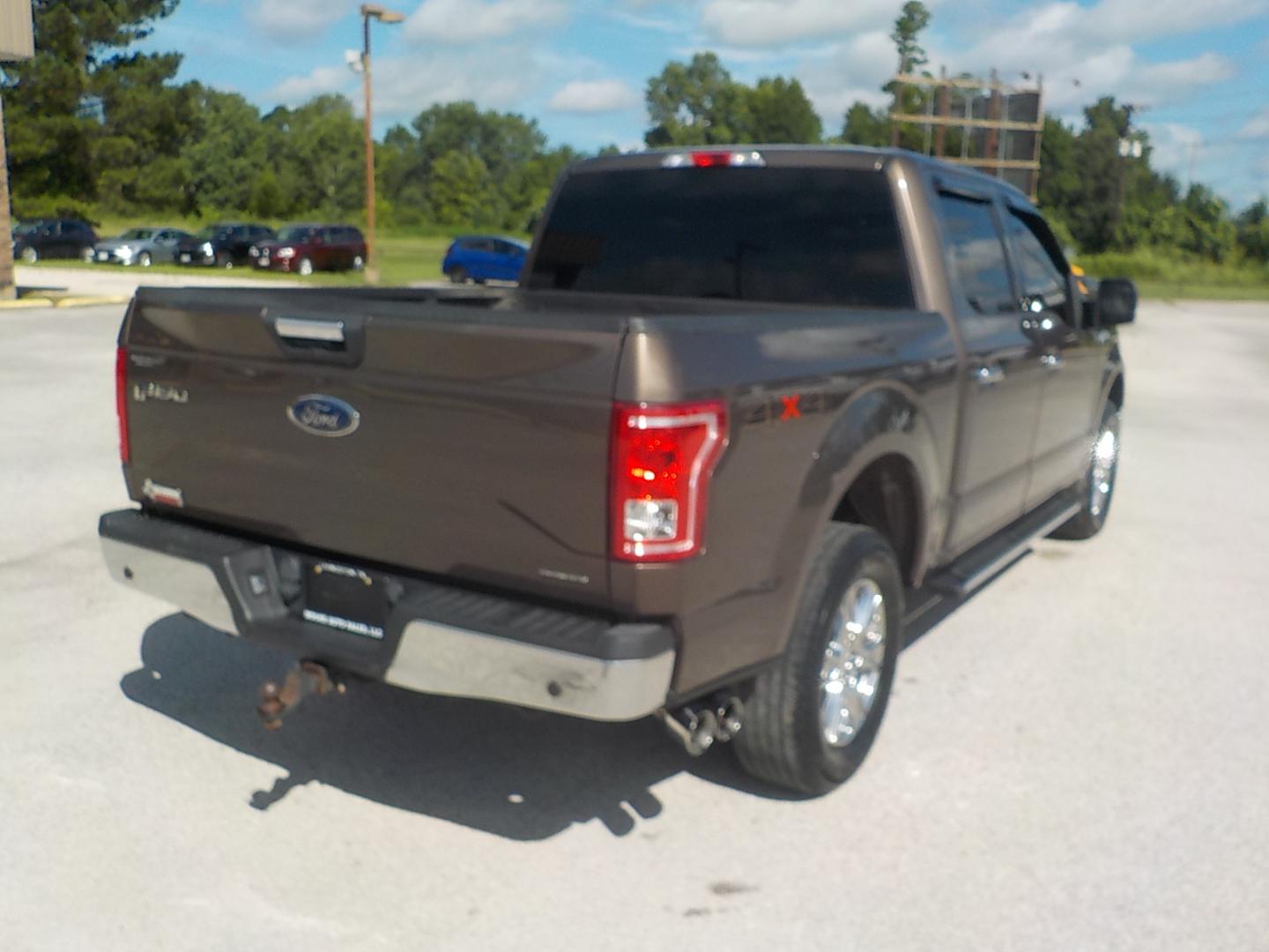 2015 Brown /Tan Ford F-150 XLT SuperCrew 6.5-ft. Bed 4WD (1FTEW1EF0FK) with an 5.0L V8 engine, 6-Speed Automatic transmission, located at 1617 W Church Street, Livingston, TX, 77351, (936) 327-3600, 30.710995, -94.951157 - ONE OWNER!! Been here in Livingston all it's life. This truck was well maintained! Buy it with confidence! - Photo#6