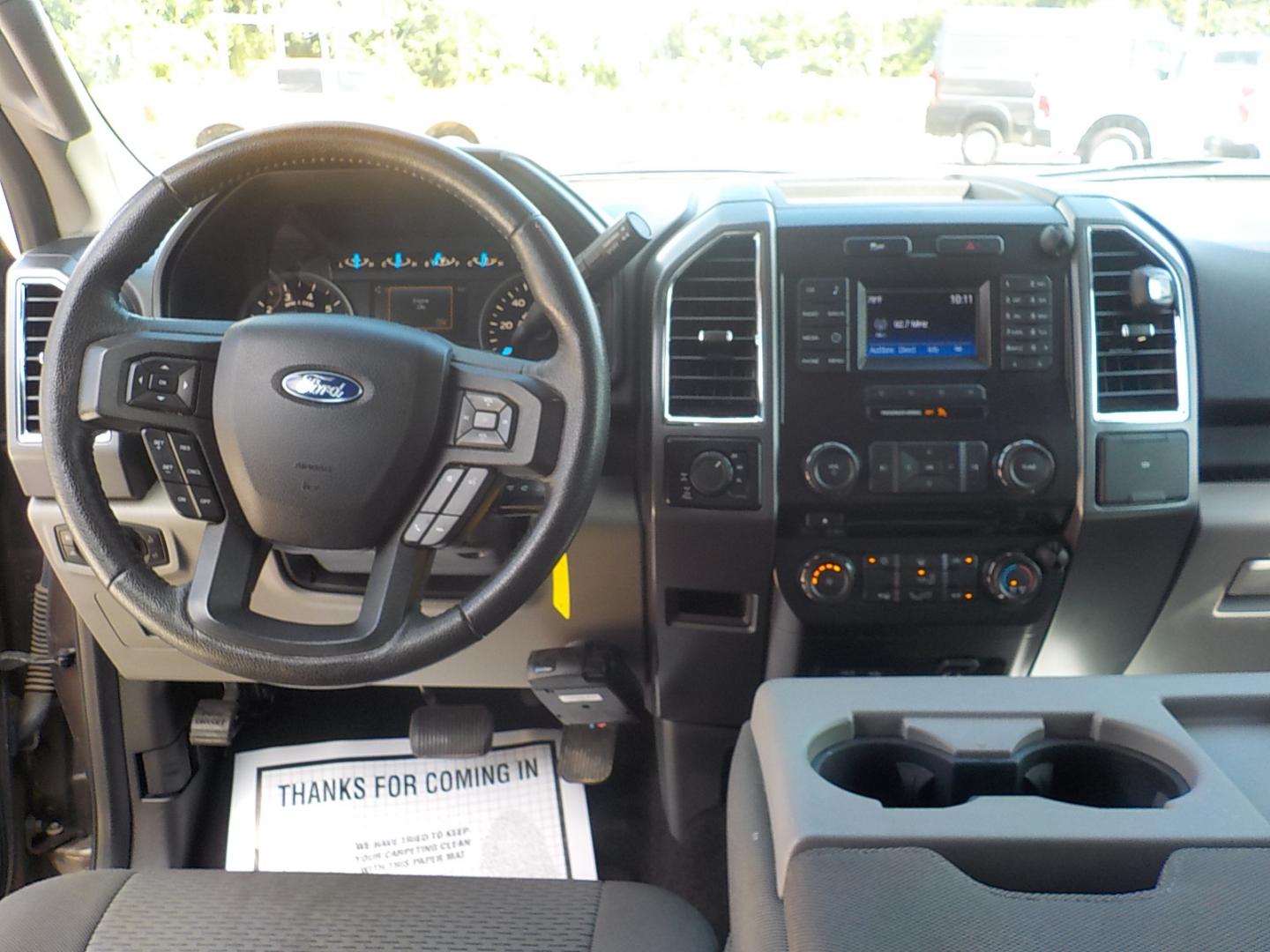 2015 Brown /Tan Ford F-150 XLT SuperCrew 6.5-ft. Bed 4WD (1FTEW1EF0FK) with an 5.0L V8 engine, 6-Speed Automatic transmission, located at 1617 W Church Street, Livingston, TX, 77351, (936) 327-3600, 30.710995, -94.951157 - ONE OWNER!! Been here in Livingston all it's life. This truck was well maintained! Buy it with confidence! - Photo#14