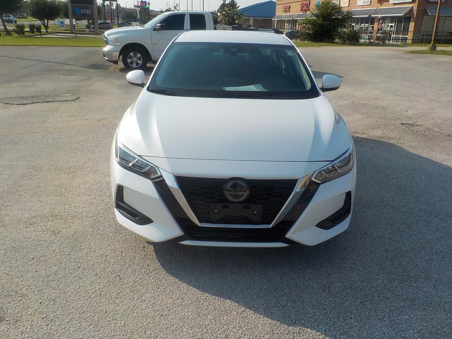 2023 White /Black Nissan Sentra SV (3N1AB8CV6PY) with an 1.8L L4 SFI DOHC 16V engine, CVT transmission, located at 1617 W Church Street, Livingston, TX, 77351, (936) 327-3600, 30.710995, -94.951157 - Good looking car that will get you where you need to be in style!! - Photo#2