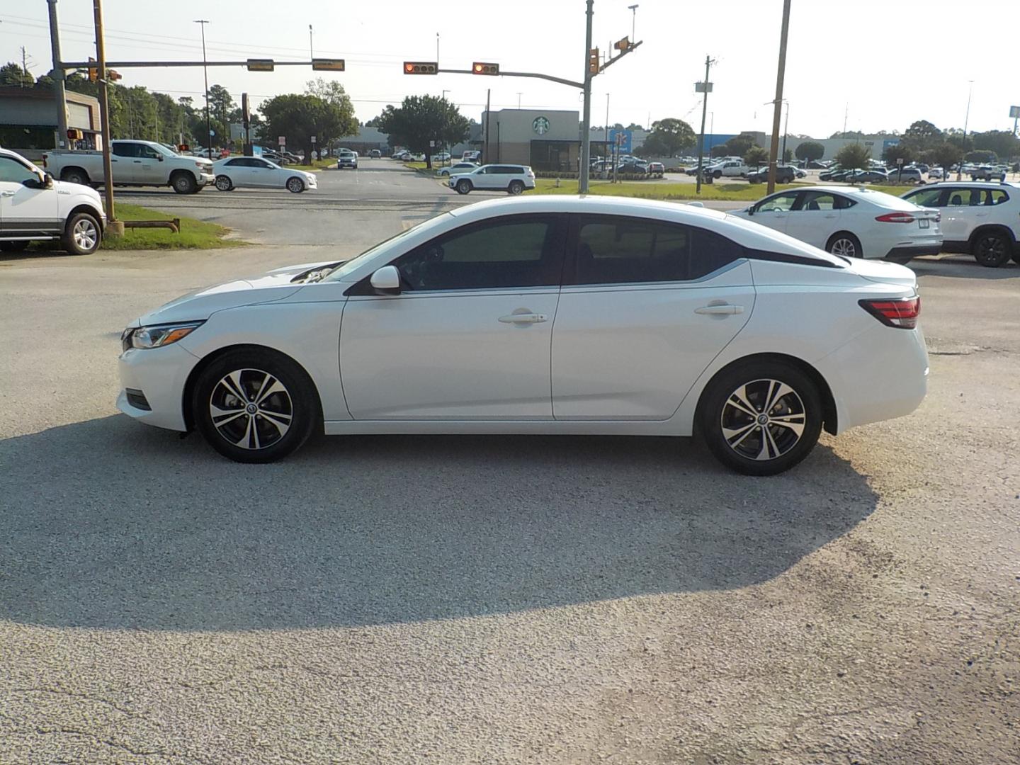 2023 White /Black Nissan Sentra SV (3N1AB8CV6PY) with an 1.8L L4 SFI DOHC 16V engine, CVT transmission, located at 1617 W Church Street, Livingston, TX, 77351, (936) 327-3600, 30.710995, -94.951157 - Good looking car that will get you where you need to be in style!! - Photo#4