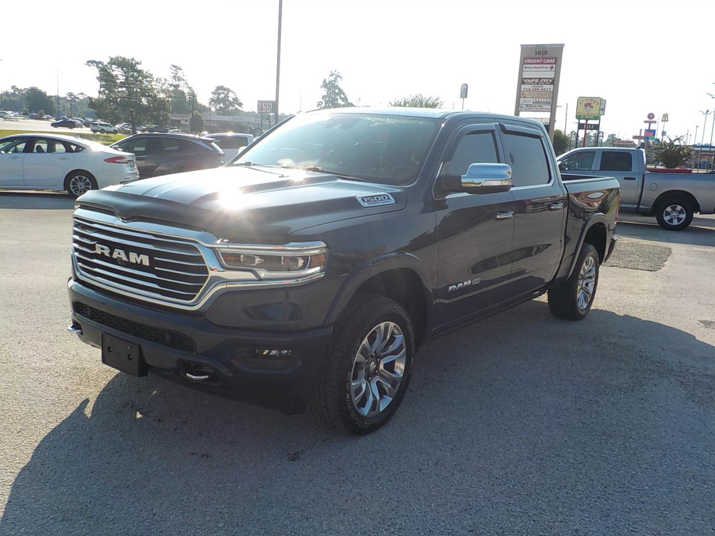2021 Blue /Tan RAM 1500 Longhorn Crew Cab SWB 4WD (1C6SRFKT5MN) with an 5.7L V8 OHV 16V engine, 8A transmission, located at 1617 W Church Street, Livingston, TX, 77351, (936) 327-3600, 30.710995, -94.951157 - ONE OWNER!! LOW MILES!! IMMACULATE!! - Photo#3