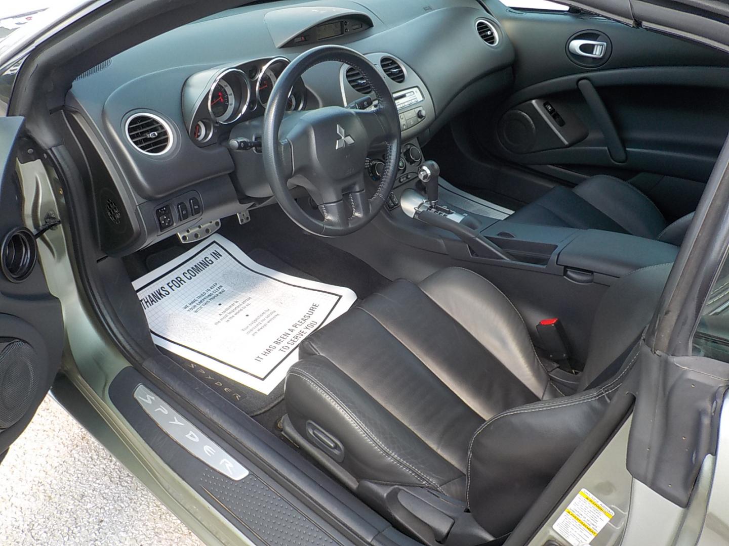 2008 Lt Green /Black Mitsubishi Eclipse GT Spyder (4A3AL35TX8E) with an 3.8L V6 SOHC 24V engine, Automatic transmission, located at 1617 W Church Street, Livingston, TX, 77351, (936) 327-3600, 30.710995, -94.951157 - LOW LOW MILES! And yes, that is the correct miles! Garage kept all it's life. This car is hard to believe how clean it is! If you want a convertible to sport around in on the weekends and don't want to spend a fortune this is the ONE! - Photo#13
