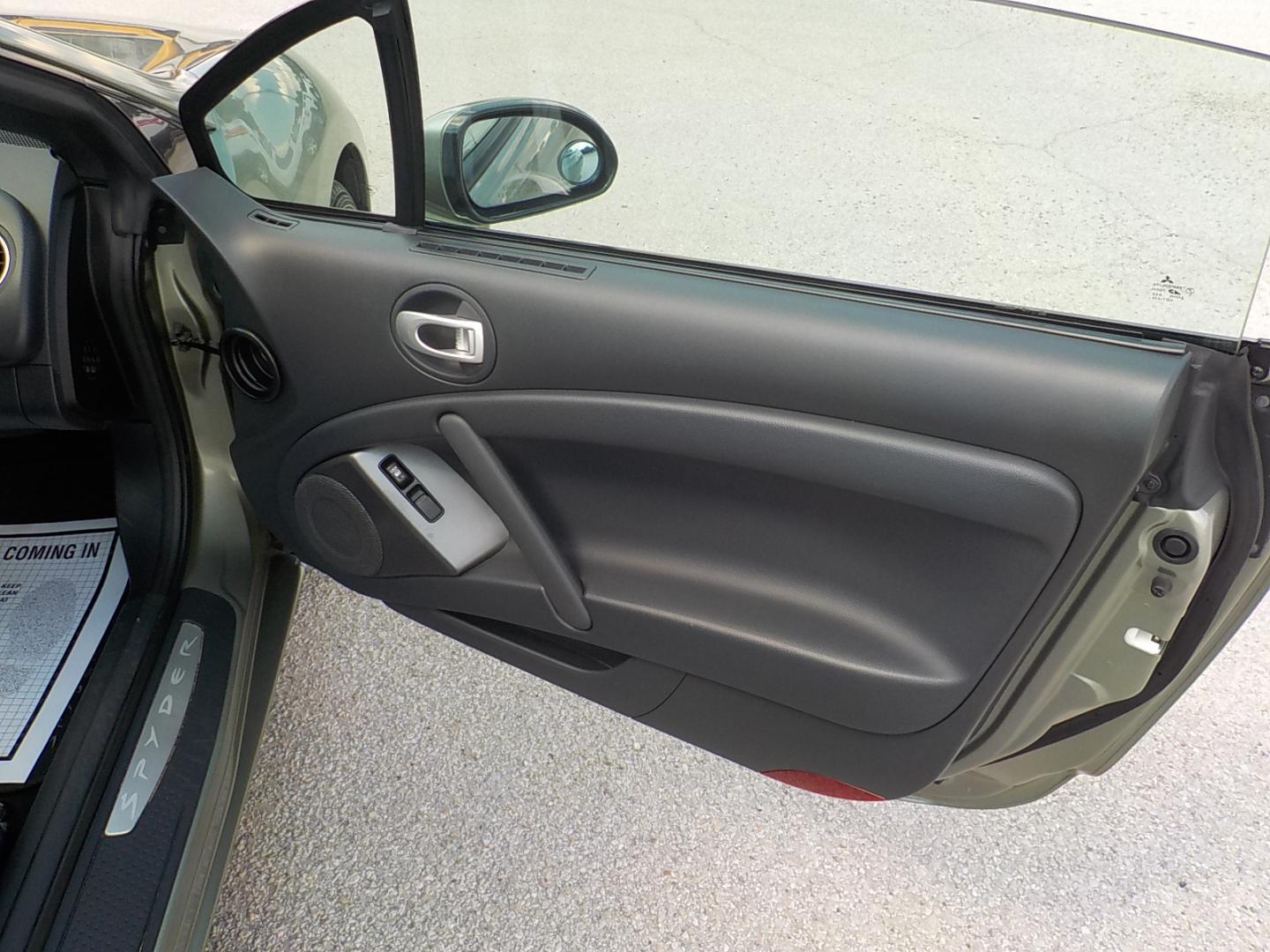 2008 Lt Green /Black Mitsubishi Eclipse GT Spyder (4A3AL35TX8E) with an 3.8L V6 SOHC 24V engine, Automatic transmission, located at 1617 W Church Street, Livingston, TX, 77351, (936) 327-3600, 30.710995, -94.951157 - LOW LOW MILES! And yes, that is the correct miles! Garage kept all it's life. This car is hard to believe how clean it is! If you want a convertible to sport around in on the weekends and don't want to spend a fortune this is the ONE! - Photo#16