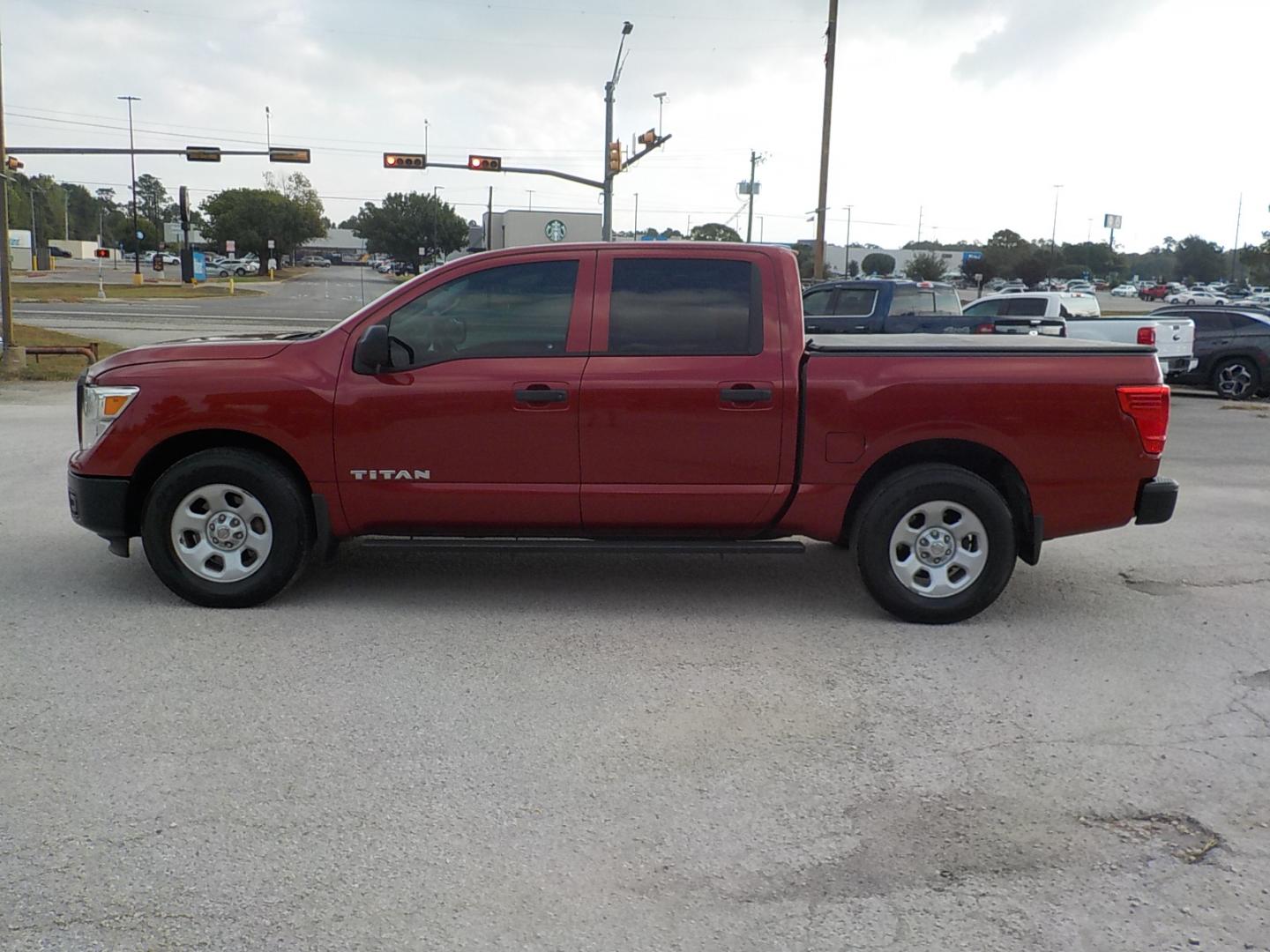 2017 Maroon /Black Nissan Titan S Crew Cab 2WD (1N6AA1EK3HN) with an 5.6L V8 DOHC 32V engine, 6A transmission, located at 1617 W Church Street, Livingston, TX, 77351, (936) 327-3600, 30.710995, -94.951157 - Extremely nice truck for the money!! Come check it out for yourself - Photo#4